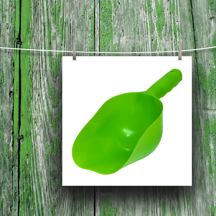 Grüne Sandschaufel aus Kunststoff. Fassungsvermögen 600 ml.